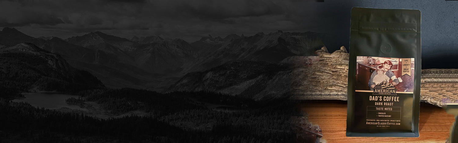 Bag of American Classic Dad's Coffee Dark Roast behind a log and a scenic mountain background